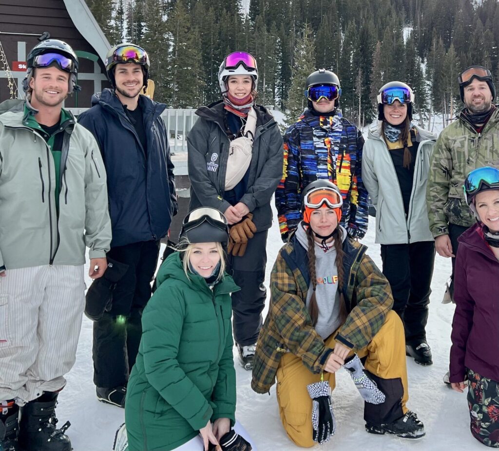 skiers posed on a mountain